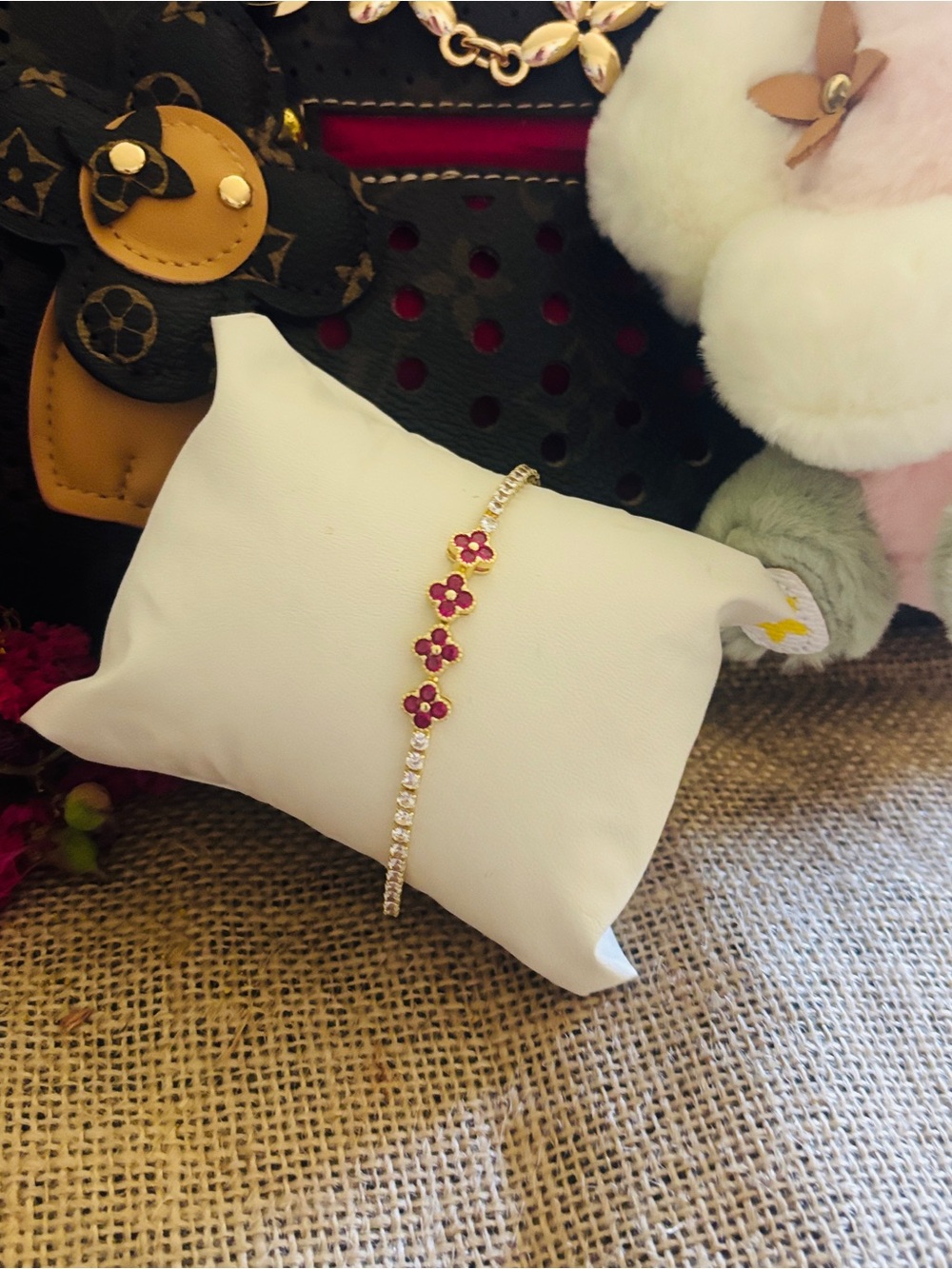7.5 Gold Tennis Bracelet with Pink Flower Accents
